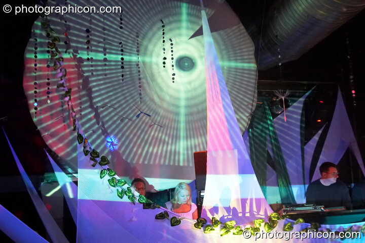 Nadine DJing in the IDSpiral space with projections by  Inside-Us-All at The Synergy Project. London, United Kingdom. © 2006 Photographicon
