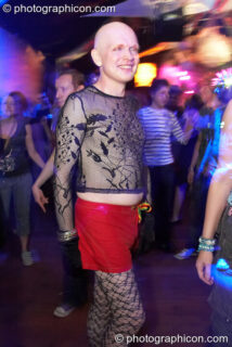 Man in drag dances in the Liquid Records space at The Synergy Project. London, United Kingdom. © 2007 Photographicon