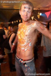 Man with painted body artwork by Lifes4Living at The Synergy Project. London, United Kingdom. © 2007 Photographicon