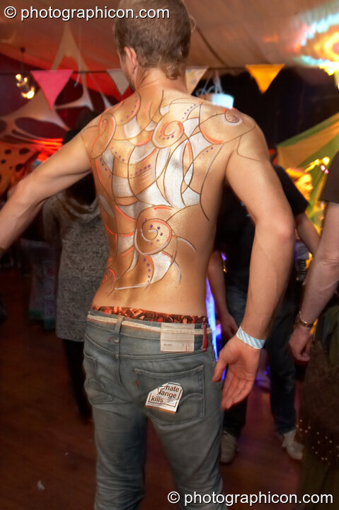 Man with painted body artwork by Lifes4Living at The Synergy Project. London, United Kingdom. © 2007 Photographicon