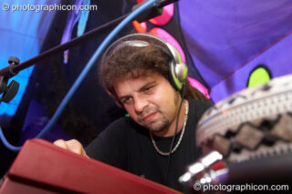 Mindflux of Zubzub tweaks his synth on the Mistzfiedmind stage at The Synergy Project. London, United Kingdom. © 2007 Photographicon