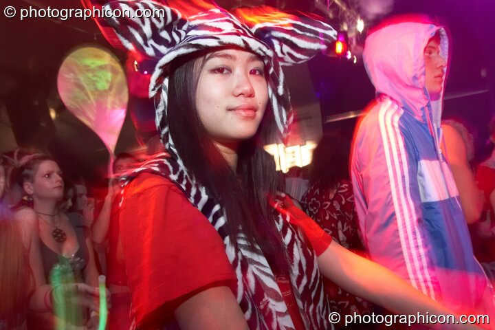 A woman dances in the Oxjam Room at The Synergy Project. London, United Kingdom. © 2007 Photographicon