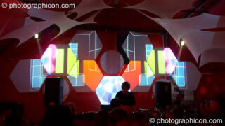 Liquid Djems (Liquid Records, UK) DJs to a backdrop visual installation by Pixel Addicts in the Ecoshelter / Archangel Breaks / Nu-School Hippies room at The Synergy Project. London, United Kingdom. © 2007 Photographicon