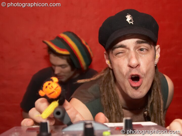 Bruce Selkirk of Pixel Addicts helps his finger puppet operate the VJ controls in the Ecoshelter / Archangel Breaks / Nu-School Hippies room at The Synergy Project. London, United Kingdom. © 2007 Photographicon