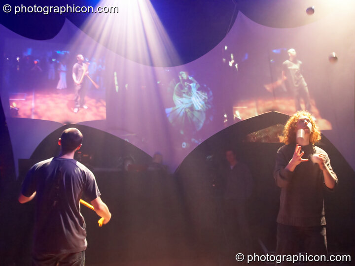 Jugglers and poi spinners play in front of Alchemik's interactive video wall in the Kundalini room at The Synergy Project. London, United Kingdom. © 2008 Photographicon