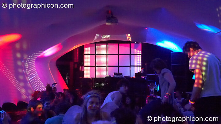 People chill inside the Folktronica room decor tunnel with VJ projections by Pixel Addicts at The Synergy Project. London, United Kingdom. © 2008 Photographicon