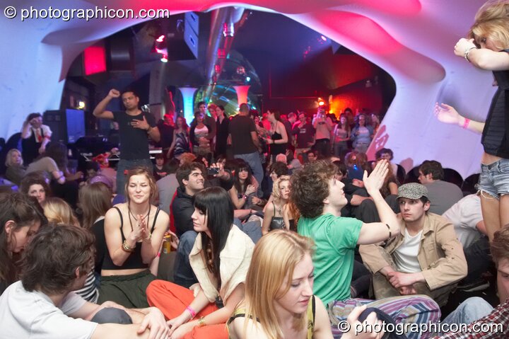 People chill inside the Folktronica room decor tunnel at The Synergy Project. London, United Kingdom. © 2008 Photographicon