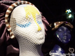 Kriwo's artwork comprising of decorated polystyrene heads in the Inspiration Hall at The Synergy Project. London, United Kingdom. © 2008 Photographicon