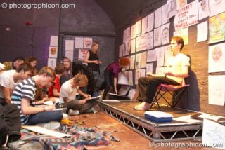 A man models while people draw during Wendalena's portraiture workshop in the Small World room at Luminopolis (formerly The Synergy Project). London, United Kingdom. © 2008 Photographicon