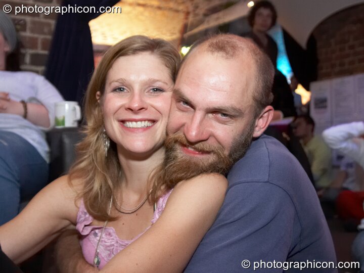 A man and woman snuggle in the Inspiration Hall at Luminopolis (formerly The Synergy Project). London, United Kingdom. © 2008 Photographicon