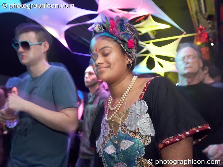 A woman dances with her eyes closed in the Liquid Records room at Luminopolis (formerly The Synergy Project). London, United Kingdom. © 2008 Photographicon