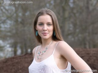 A woman shows off her jewellery during a shoot for Aksinia Jewellery. Kingston Upon Thames, United Kingdom. © 2005 Photographicon