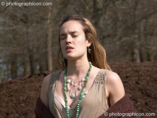 A woman shows off her jewellery during a shoot for Aksinia Jewellery. Kingston Upon Thames, United Kingdom. © 2005 Photographicon