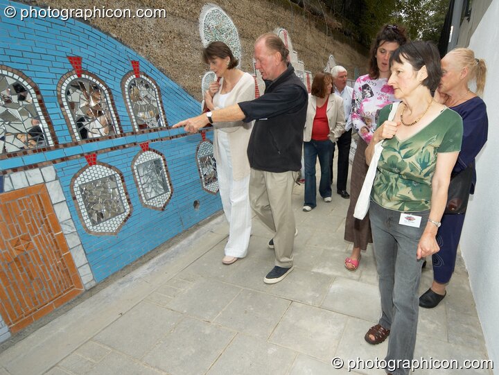 People admire Save The World Club's Hundertwasser mosaic. Kingston Upon Thames, United Kingdom. © 2005 Photographicon