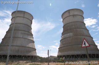 The twin towers of Athlone Power Station with their shape mirrored by a road sign, Cape Town - Western Cape, South Africa. Cape Town, South Africa. © 2005 Photographicon